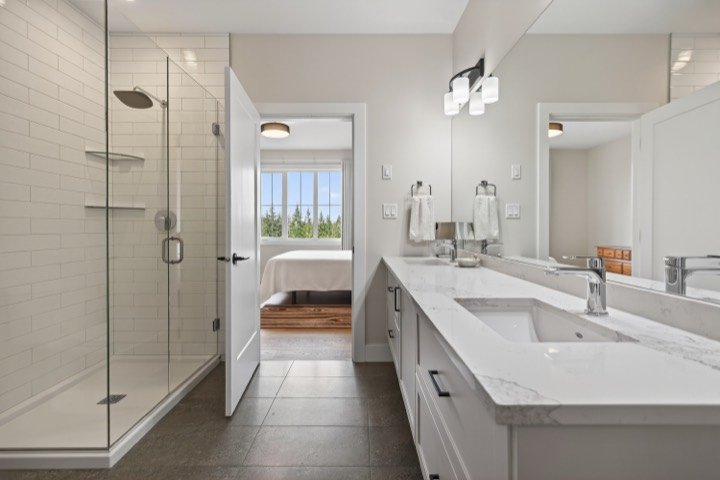 Ensuite with a glass shower and double vanity