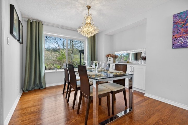 Formal dining room with a chandelier