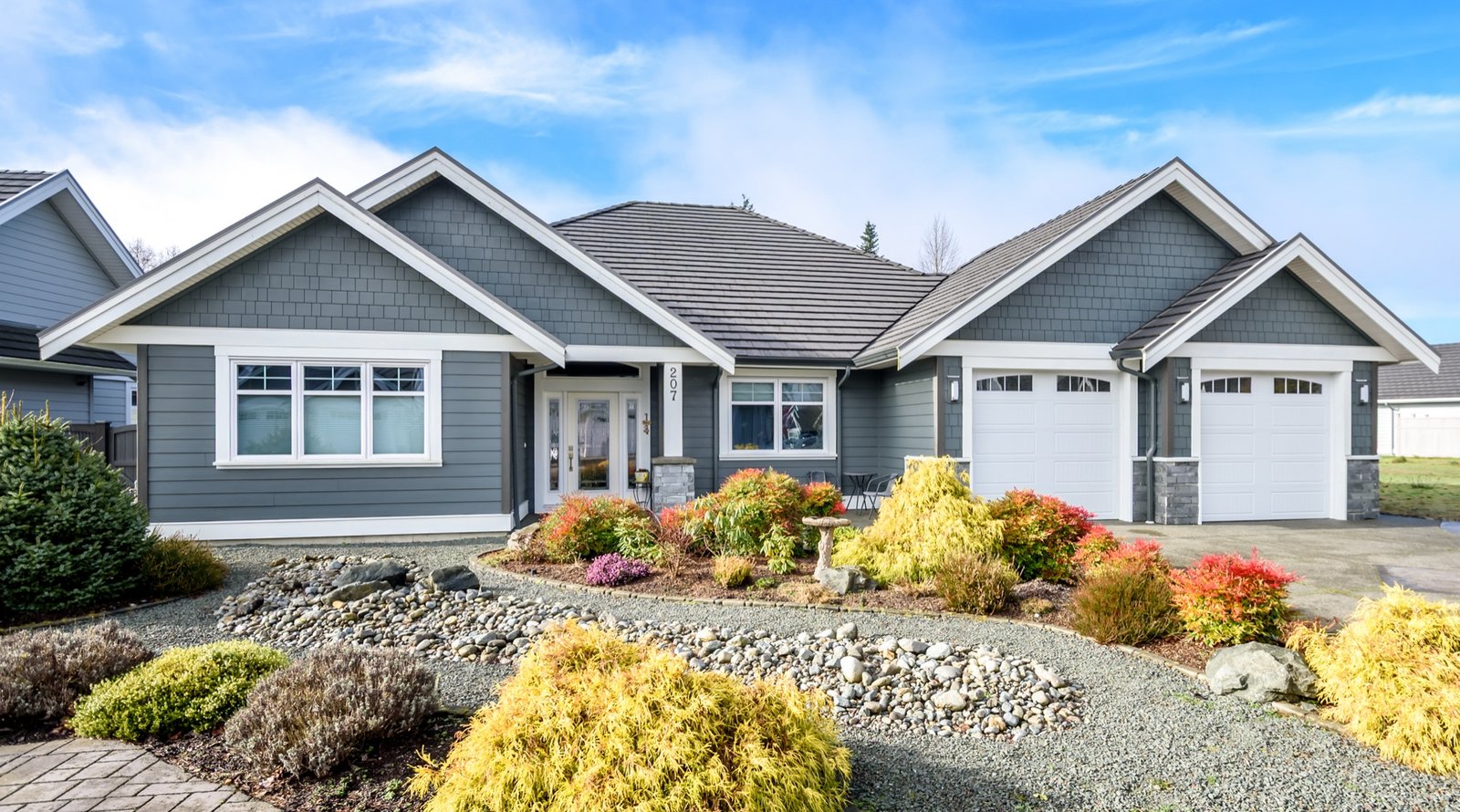Craftsman-style rancher with a landscaped front garden